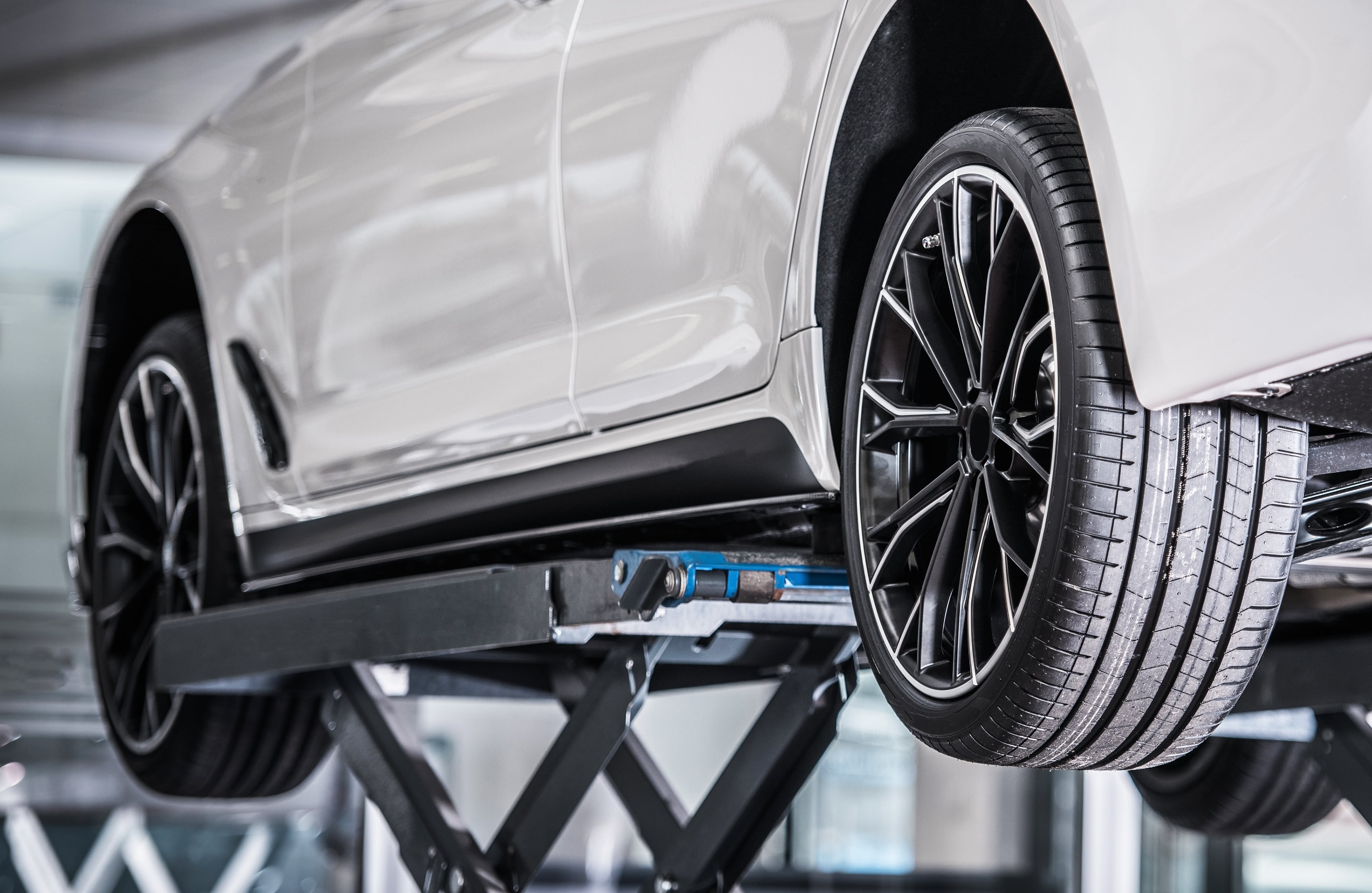 car-repair-on-a-lift-2021-08-26-23-04-45-utc-min